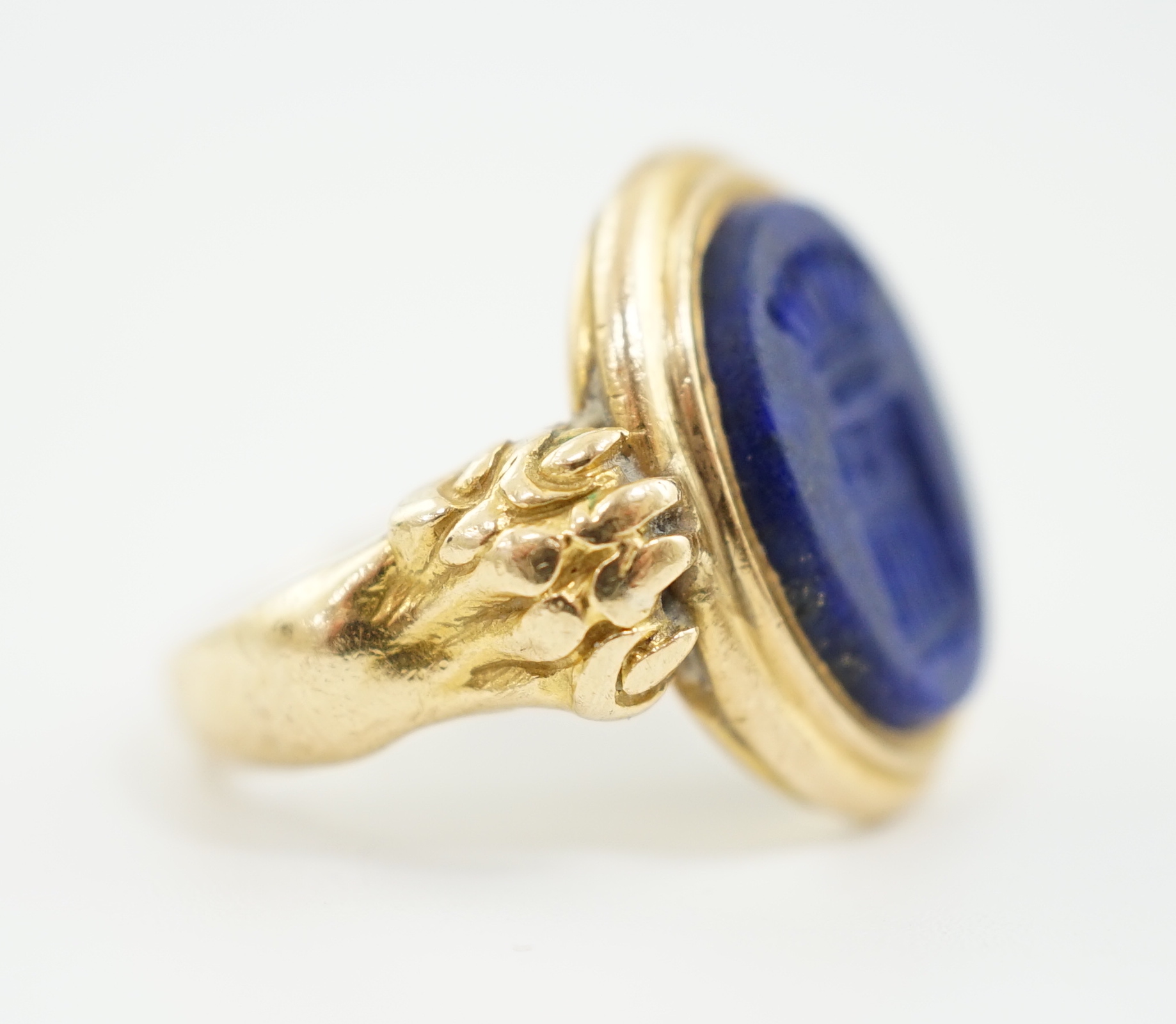 A 19th century gold and lapis lazuli set intaglio ring